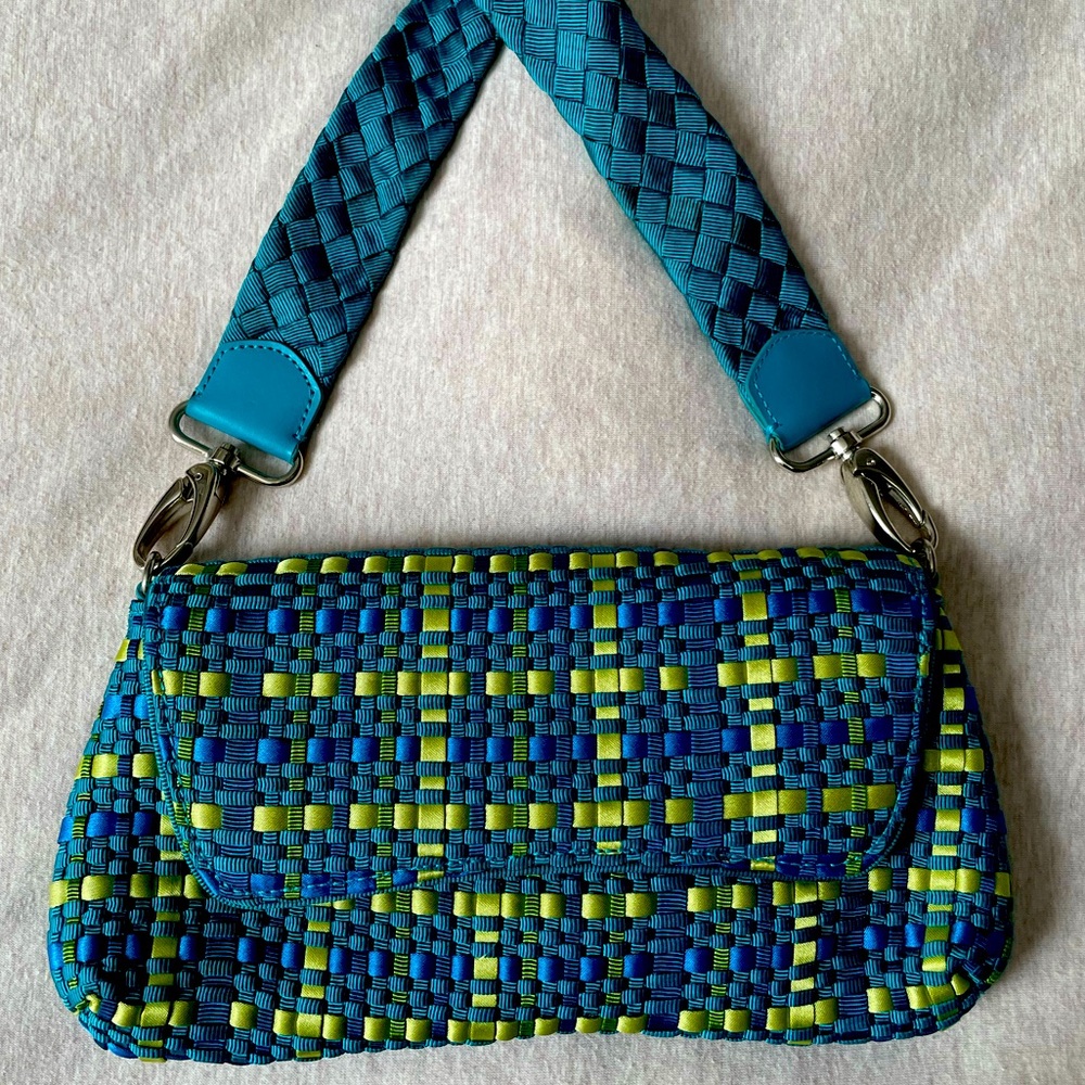 The Sak turquoise and lime green woven purse.